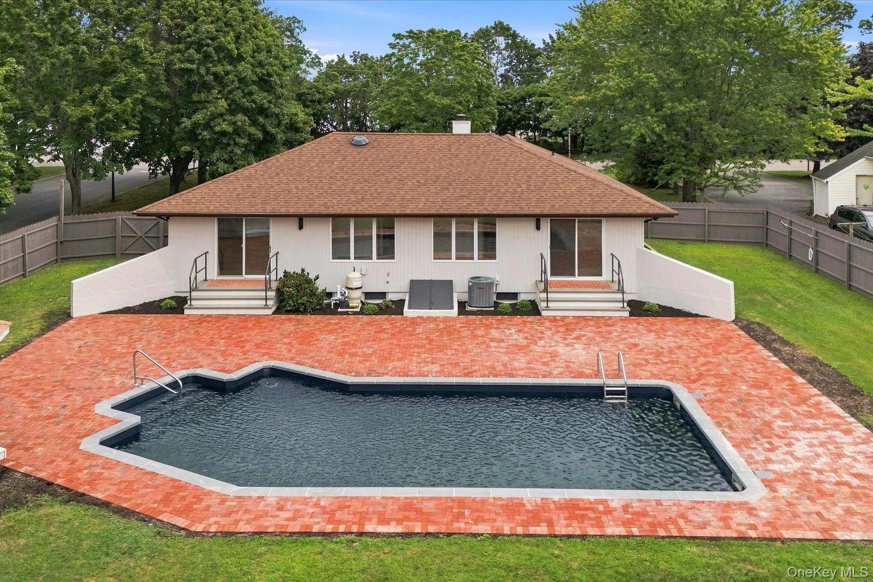 Rear unground pool and patio Rear unground pool and patio