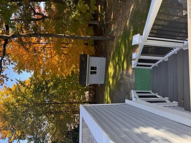 Deck with a storage shed Deck with a storage shed