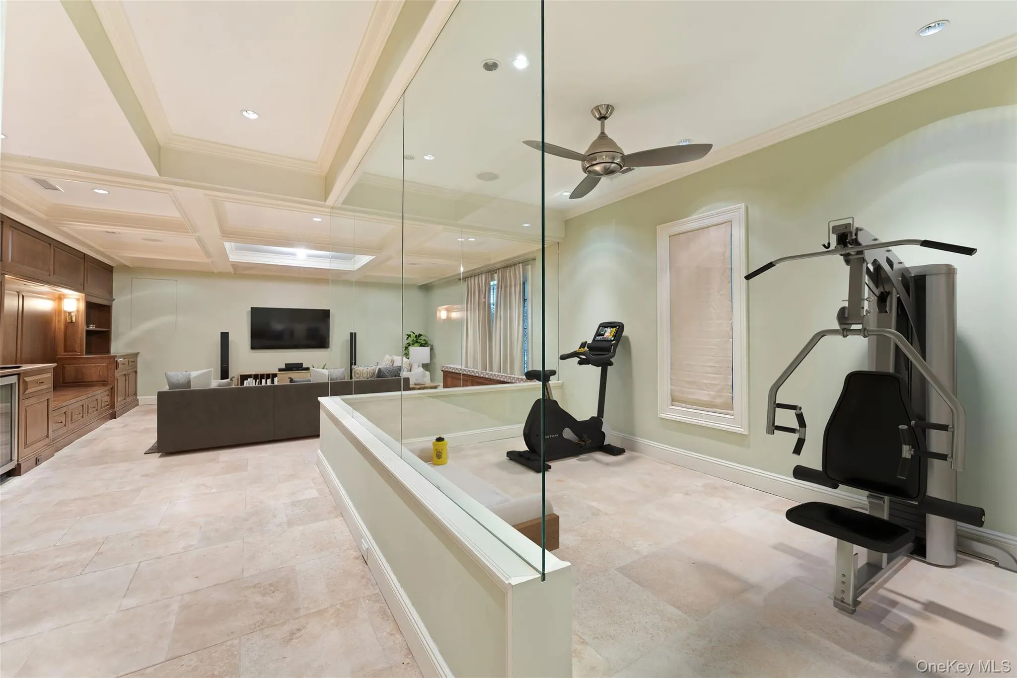 Virtually staged gym area with glass enclosure Virtually staged gym area with glass enclosure
