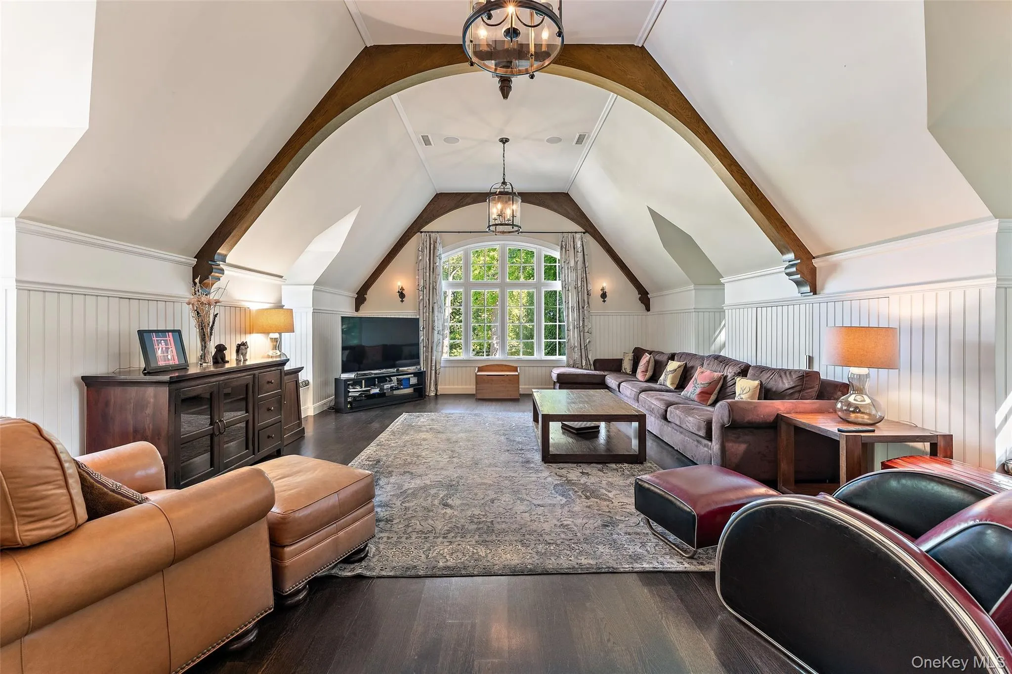 Second floor family room view of window and beautiful beamed ceiling Second floor family room view of window and beautiful beamed ceiling