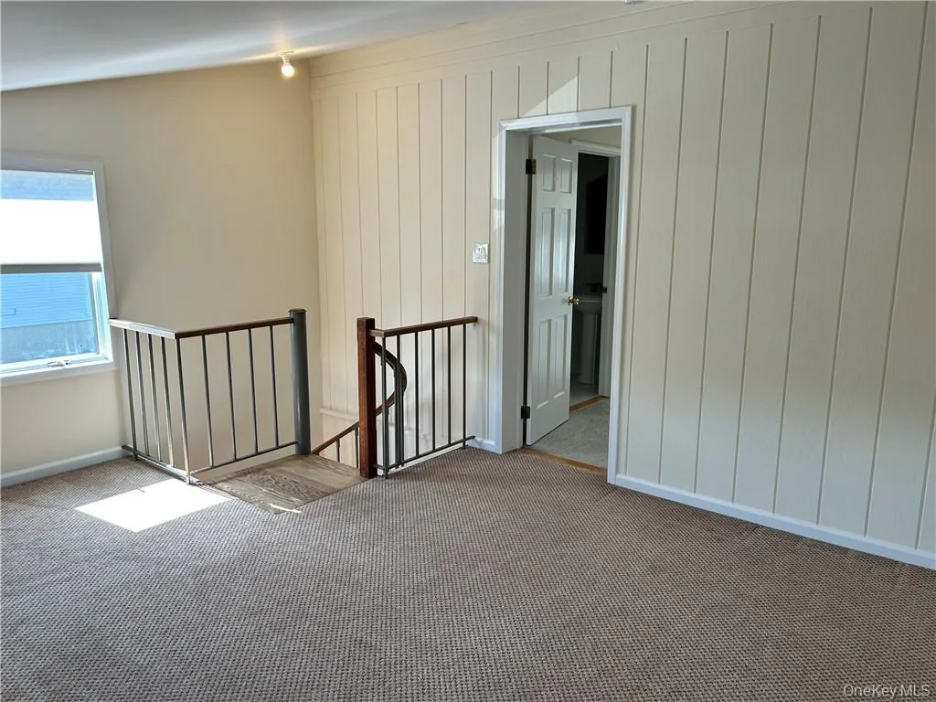 View of carpeted spare room View of carpeted spare room
