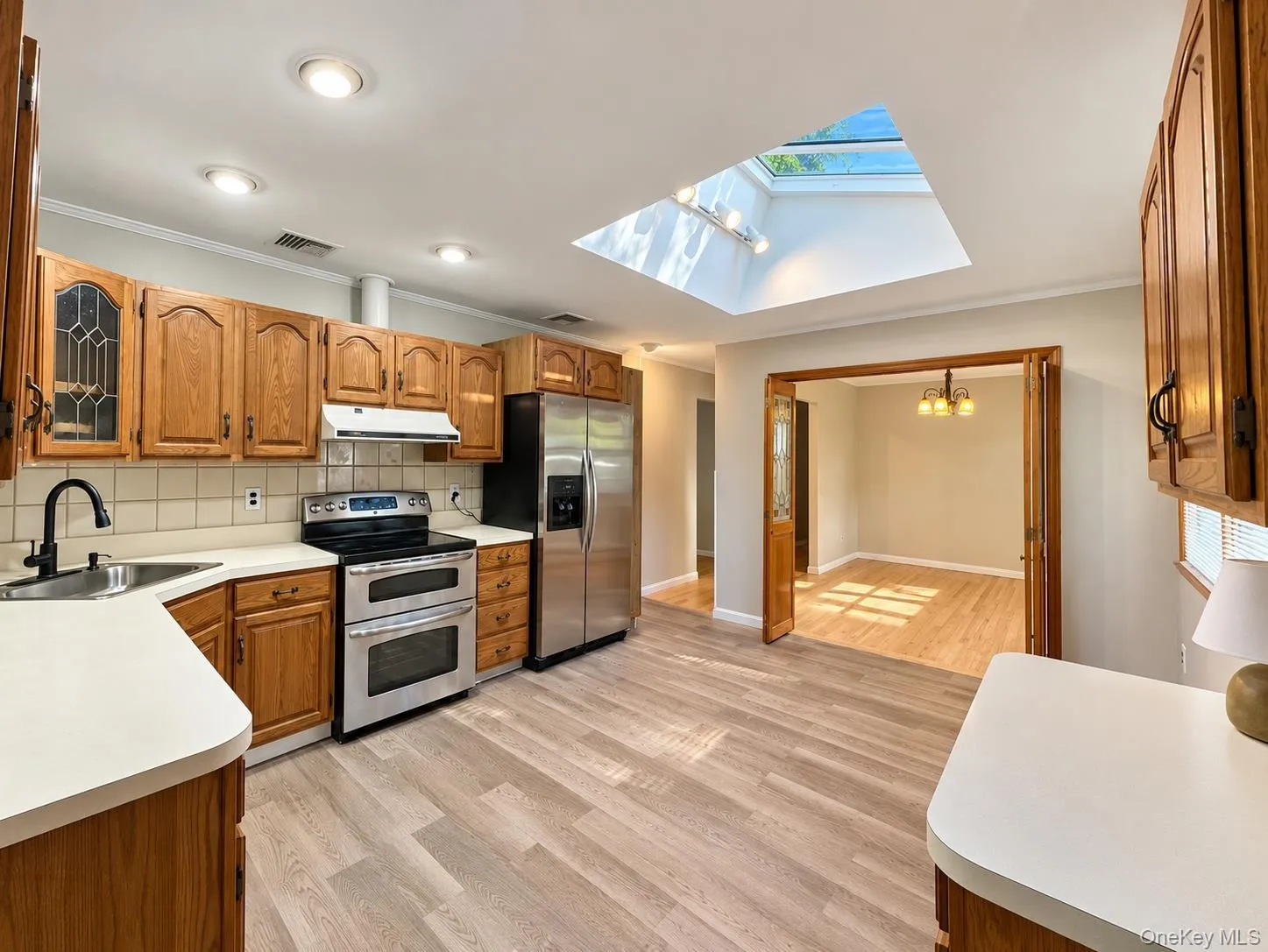 Kitchen opens to dining room Kitchen opens to dining room