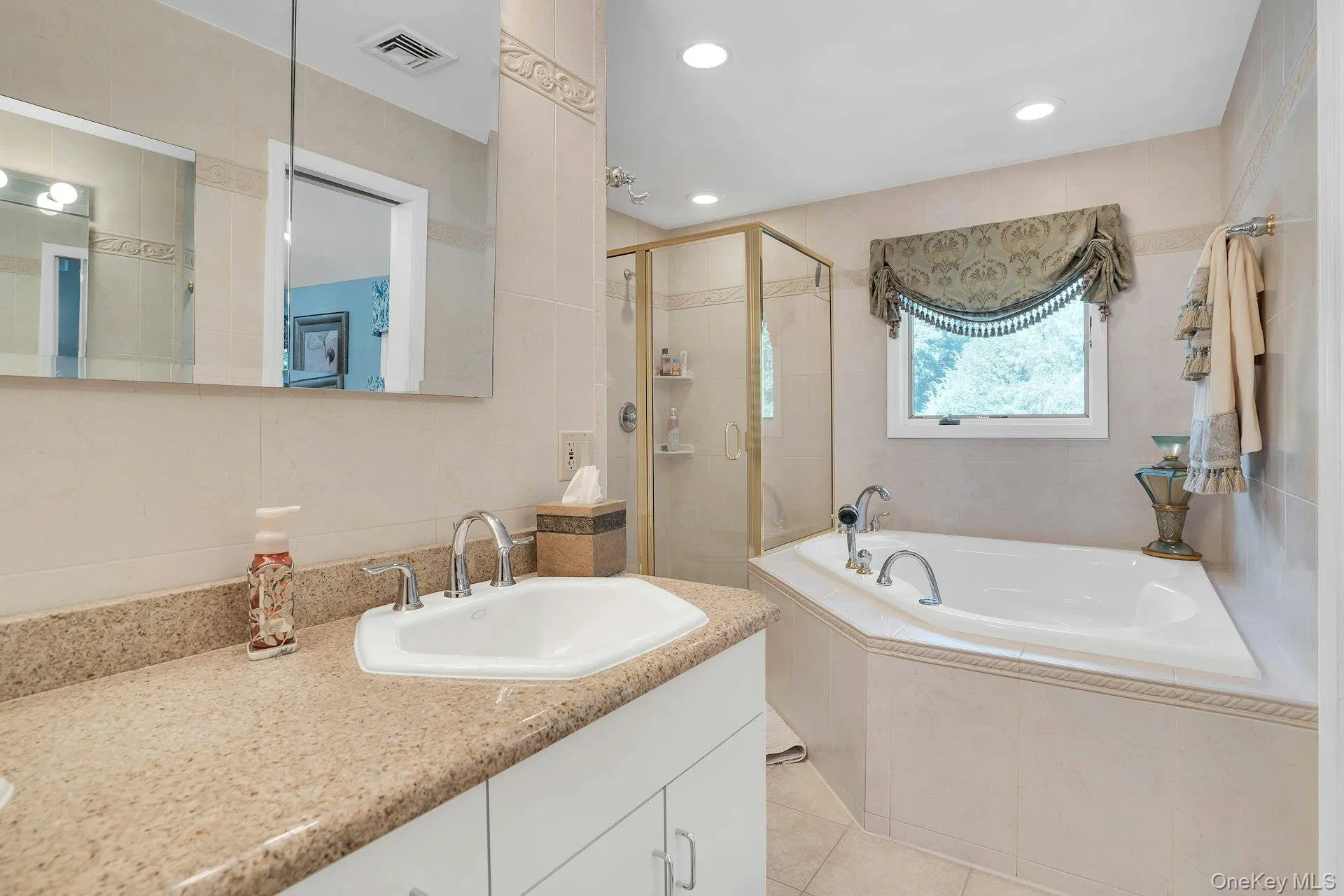 Primary ensuite bathroom with soaking tub. Primary ensuite bathroom with soaking tub.