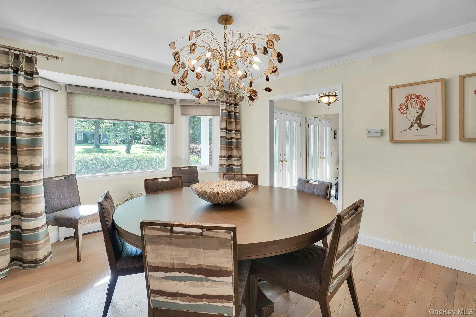 Formal dining room with picture window. Formal dining room with picture window.