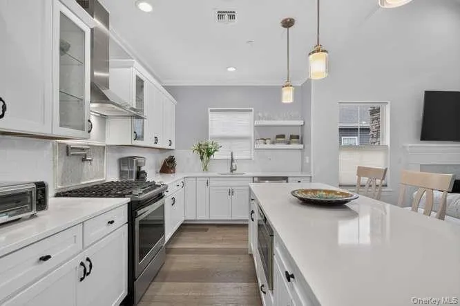 Eat in Kitchen with Granite Countertops, Stainless Steel Appliances, Gas Cooking, and Island for Seating and Gathering. Eat in Kitchen with Granite Countertops, Stainless Steel Appliances, Gas Cooking, and Island for Seating and Gathering.
