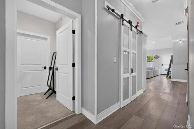 With Custom Pantry with Barn Door Sliders. With Custom Pantry with Barn Door Sliders.