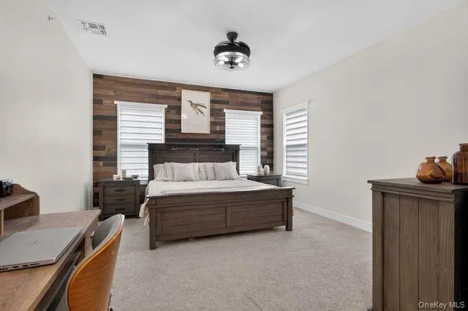 With Custom Wood Accent Wall. With Custom Wood Accent Wall.
