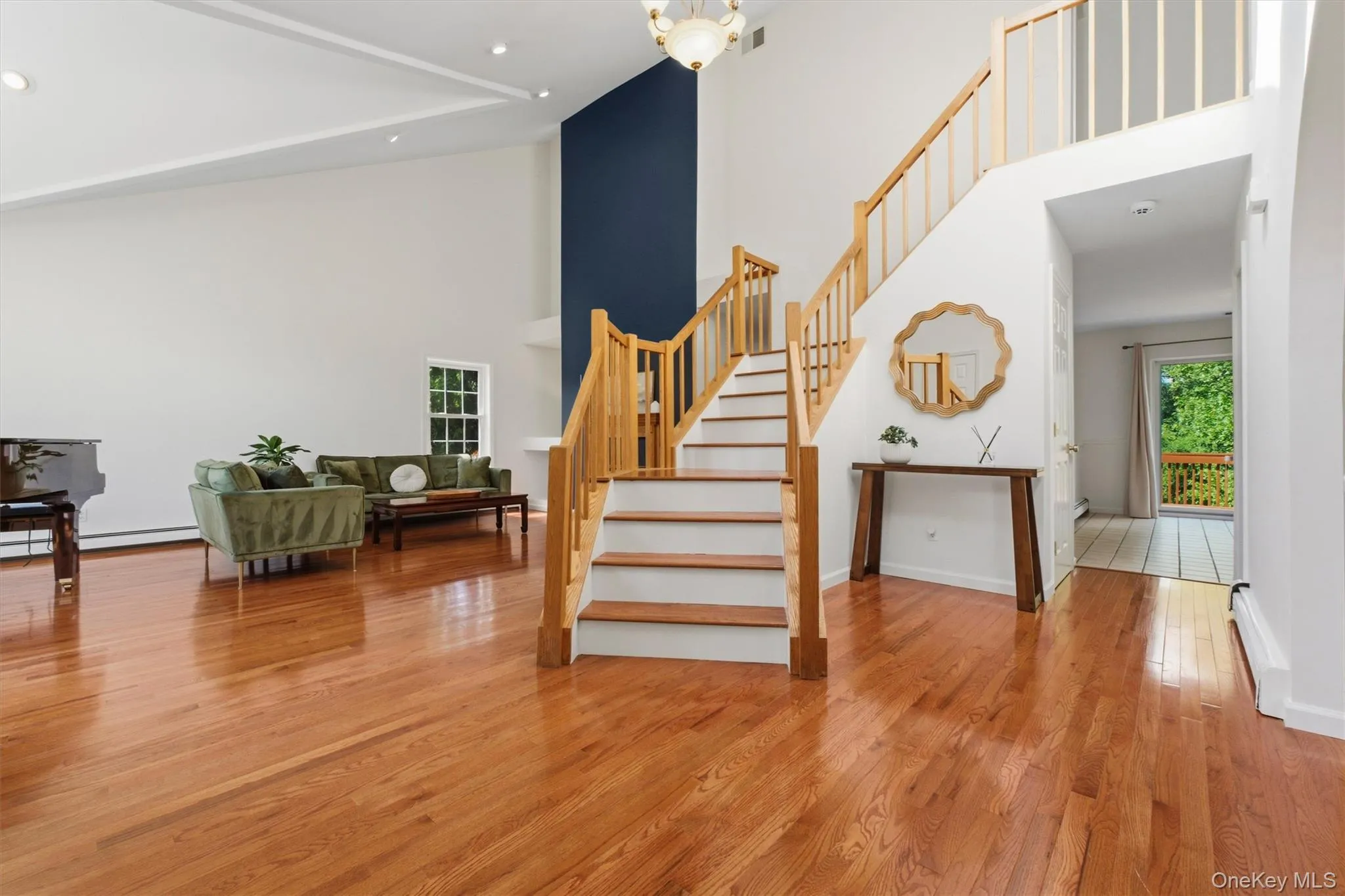 A dramatic two-story foyer introduces the bright, open interior. A dramatic two-story foyer introduces the bright, open interior.