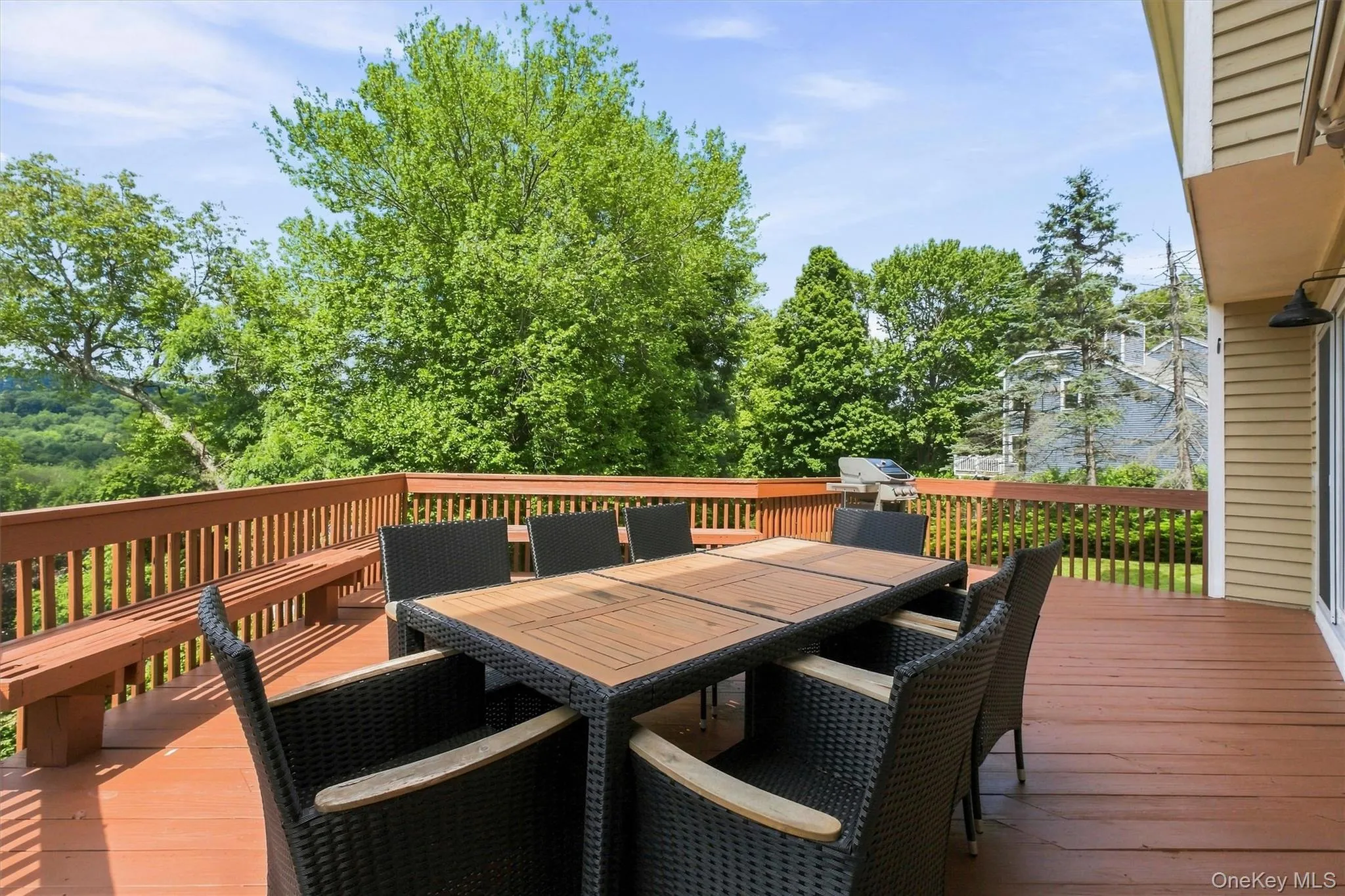 A large deck creates the perfect extension of the indoor living space. A large deck creates the perfect extension of the indoor living space.