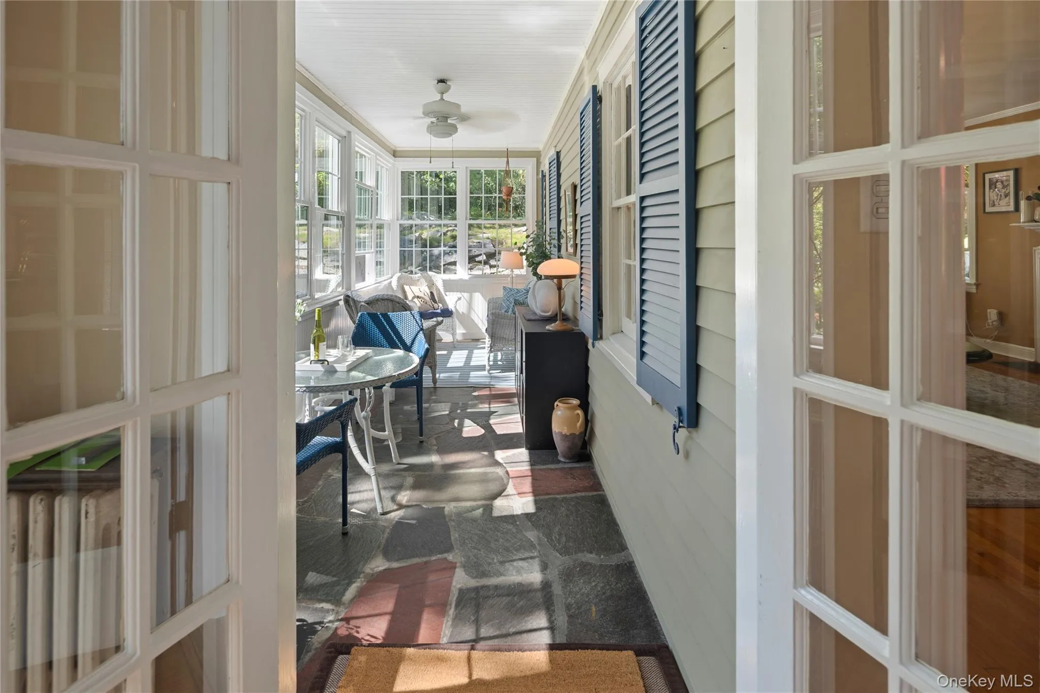 As you enter, you are greeted by the fantastic three-season sunroom. As you enter, you are greeted by the fantastic three-season sunroom.
