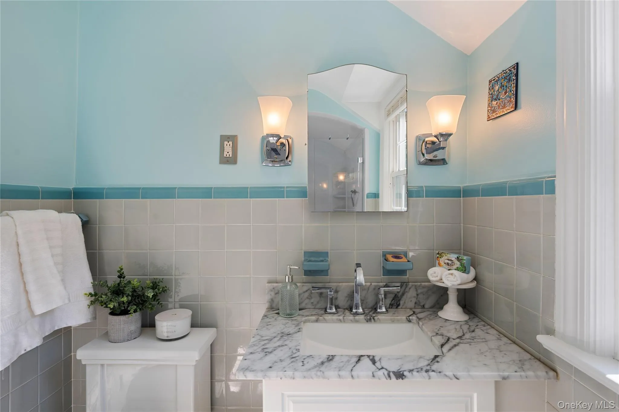 The hall bath is shared by all three bedrooms. The hall bath is shared by all three bedrooms.