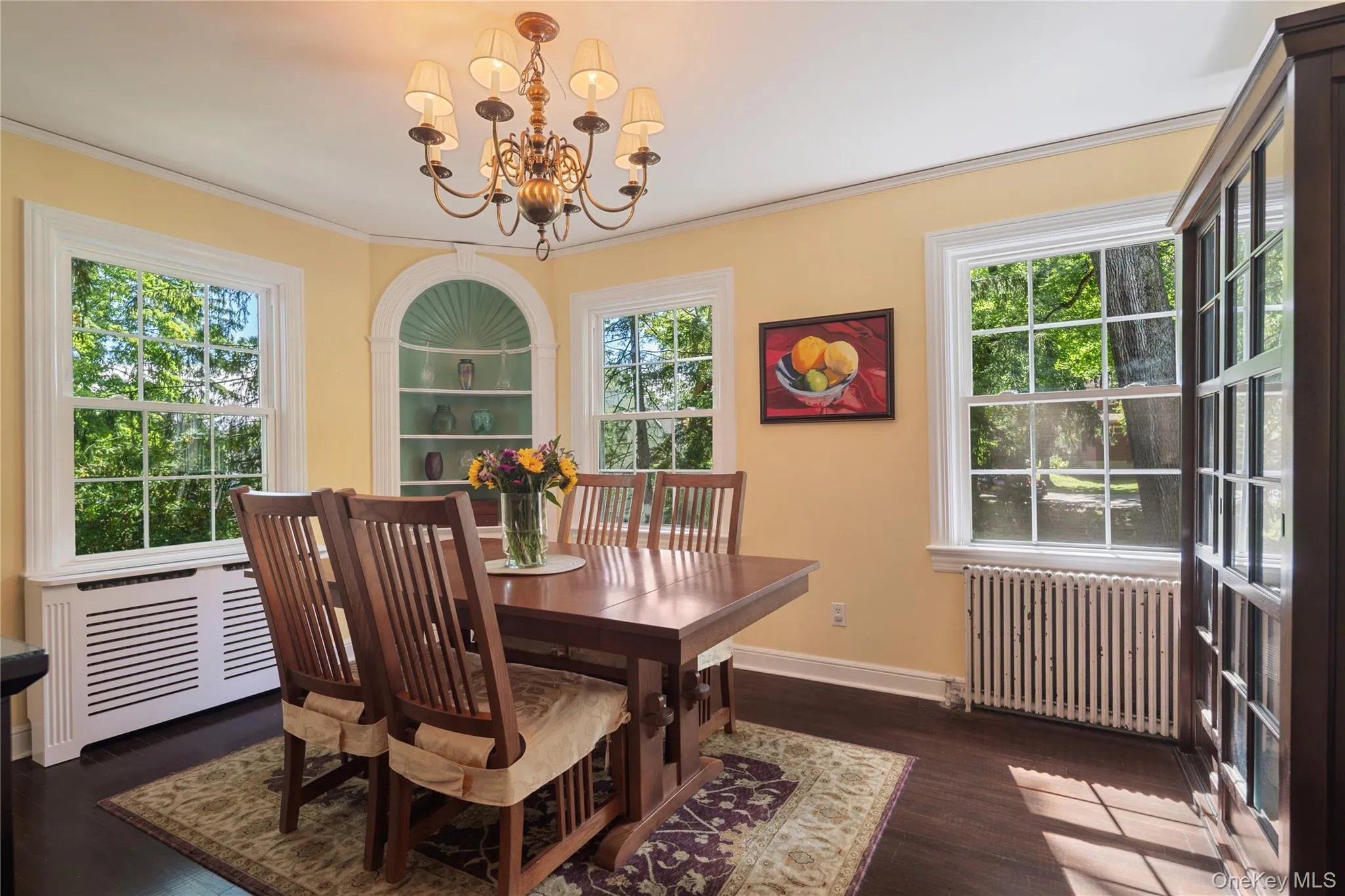 The spacious dining room is the perfect place to gather with friends and family over a shared meal. The spacious dining room is the perfect place to gather with friends and family over a shared meal.