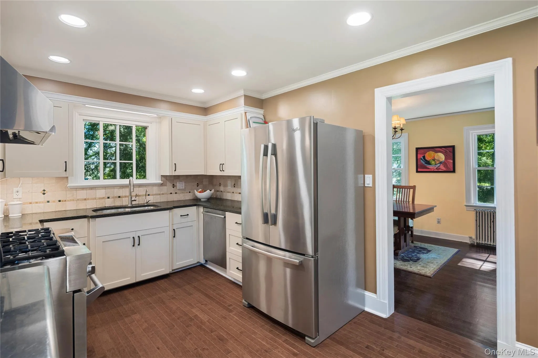 The dining room is easily accessible from the kitchen, making it perfect for entertaining. The dining room is easily accessible from the kitchen, making it perfect for entertaining.