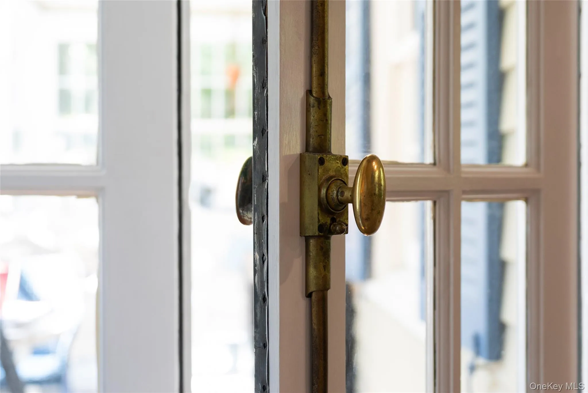 Vintage details on the original French doors that open to the sunroom are just some of the charm. Vintage details on the original French doors that open to the sunroom are just some of the charm.