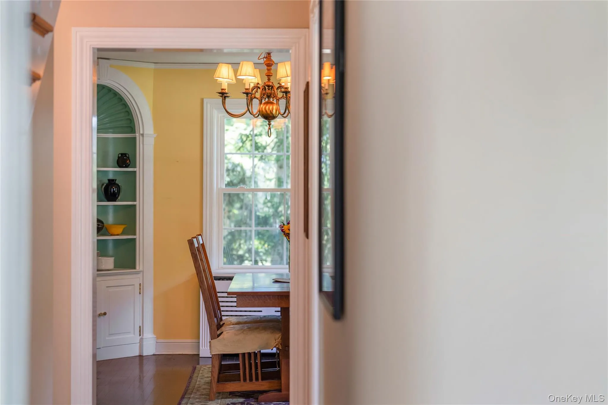 View into the dining room, showcasing the vintage details. View into the dining room, showcasing the vintage details.