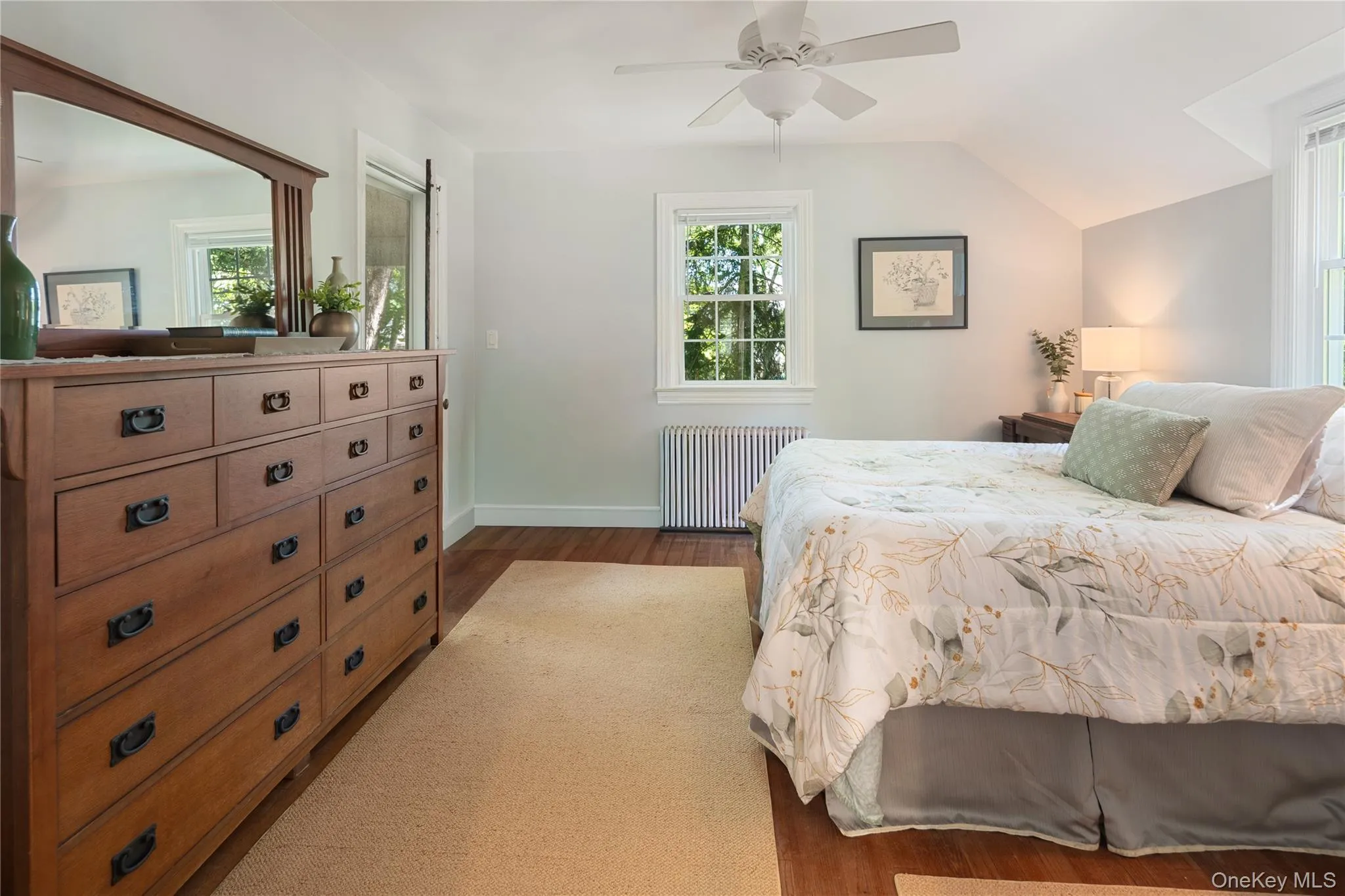 Bedroom 3. Spacious and bright, with a ceiling fan, multiple windows, and a closet. Bedroom 3. Spacious and bright, with a ceiling fan, multiple windows, and a closet.