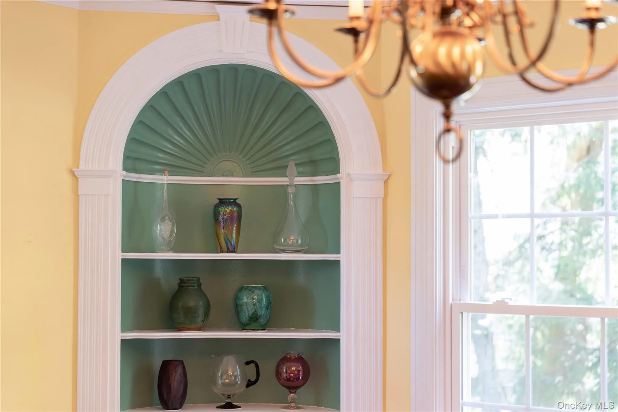 Beautiful original built-in shelves highlight the vintage details and showcase your treasures. Beautiful original built-in shelves highlight the vintage details and showcase your treasures.