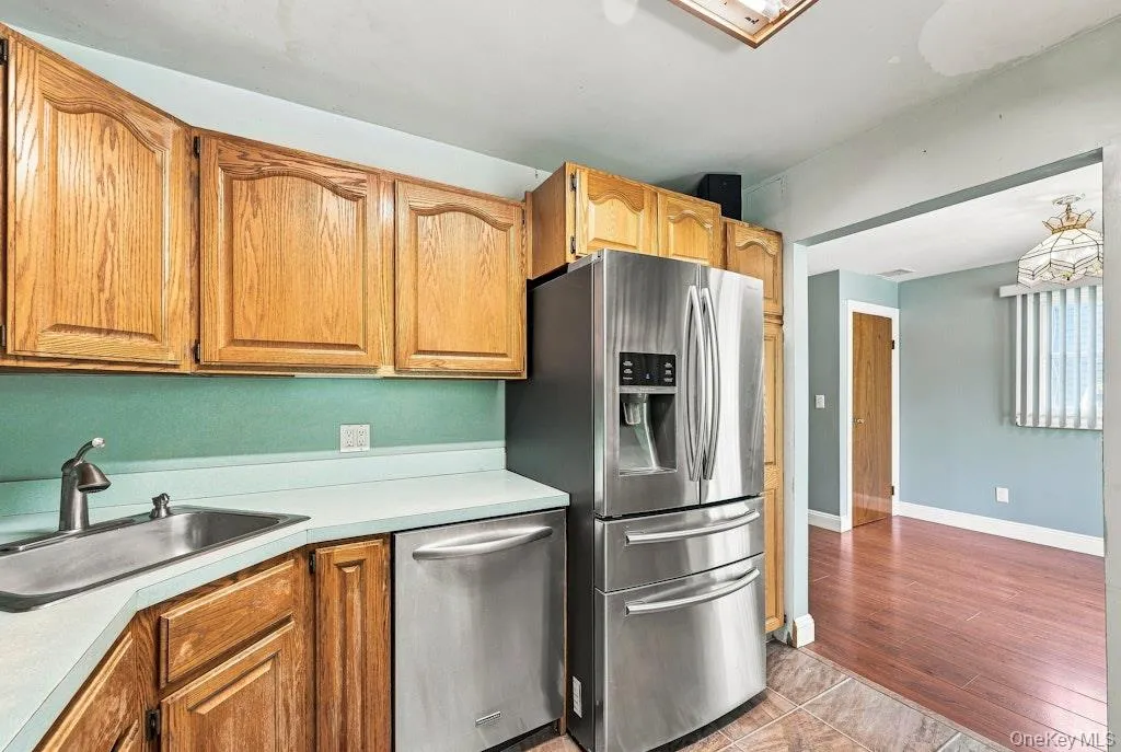 Kitchen has wood cabinets and s/s appliances First Floor Kitchen has wood cabinets and s/s appliances First Floor