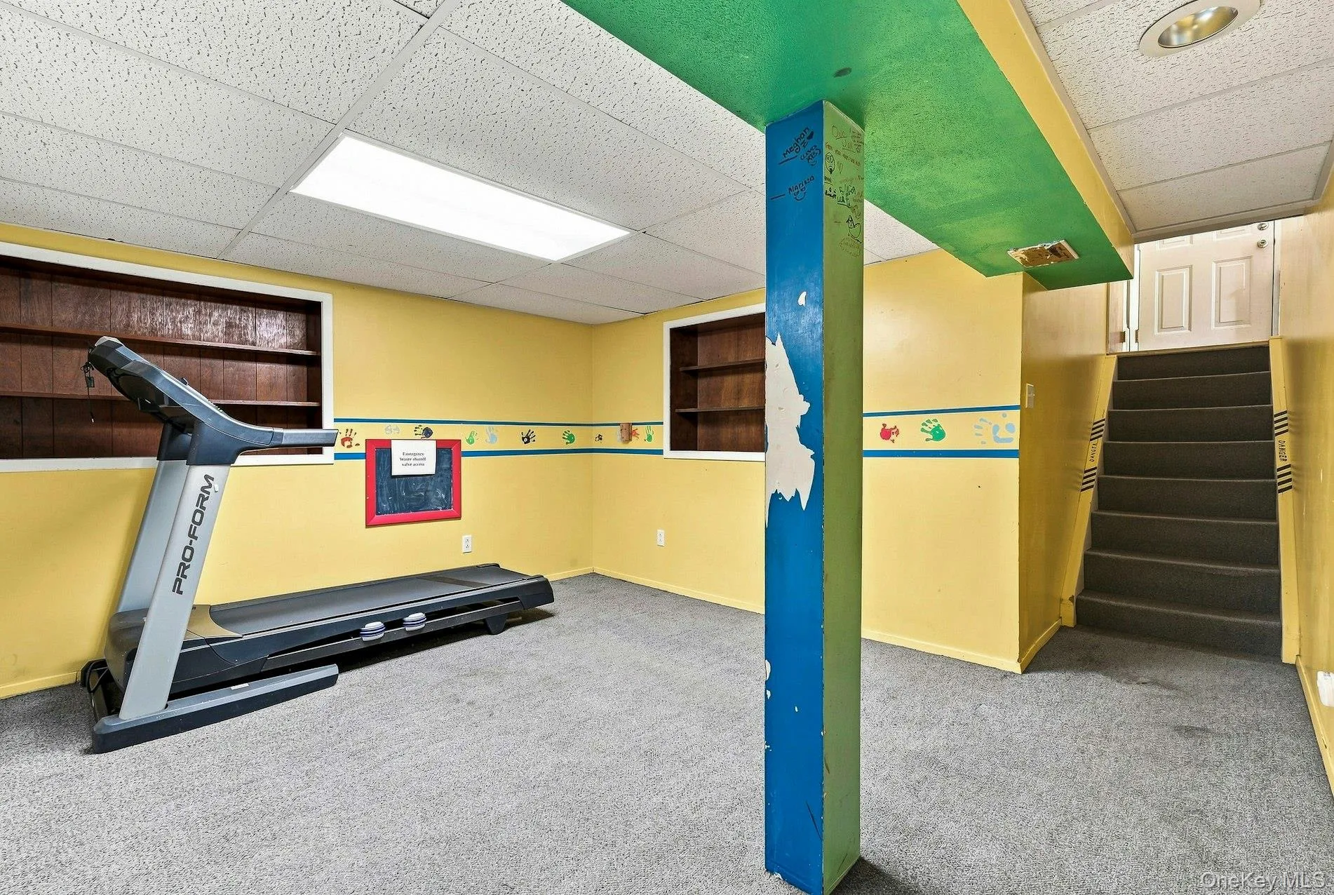 Family Room/Den Lower Level access to side door Family Room/Den Lower Level access to side door