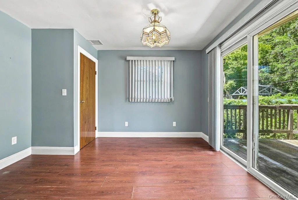 Dining Area with sliders to backyard entrance to basement First Floor Dining Area with sliders to backyard entrance to basement First Floor