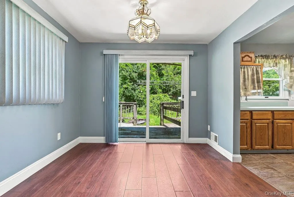 Natural light in Dining Area with sliders to backyard First Floor Natural light in Dining Area with sliders to backyard First Floor