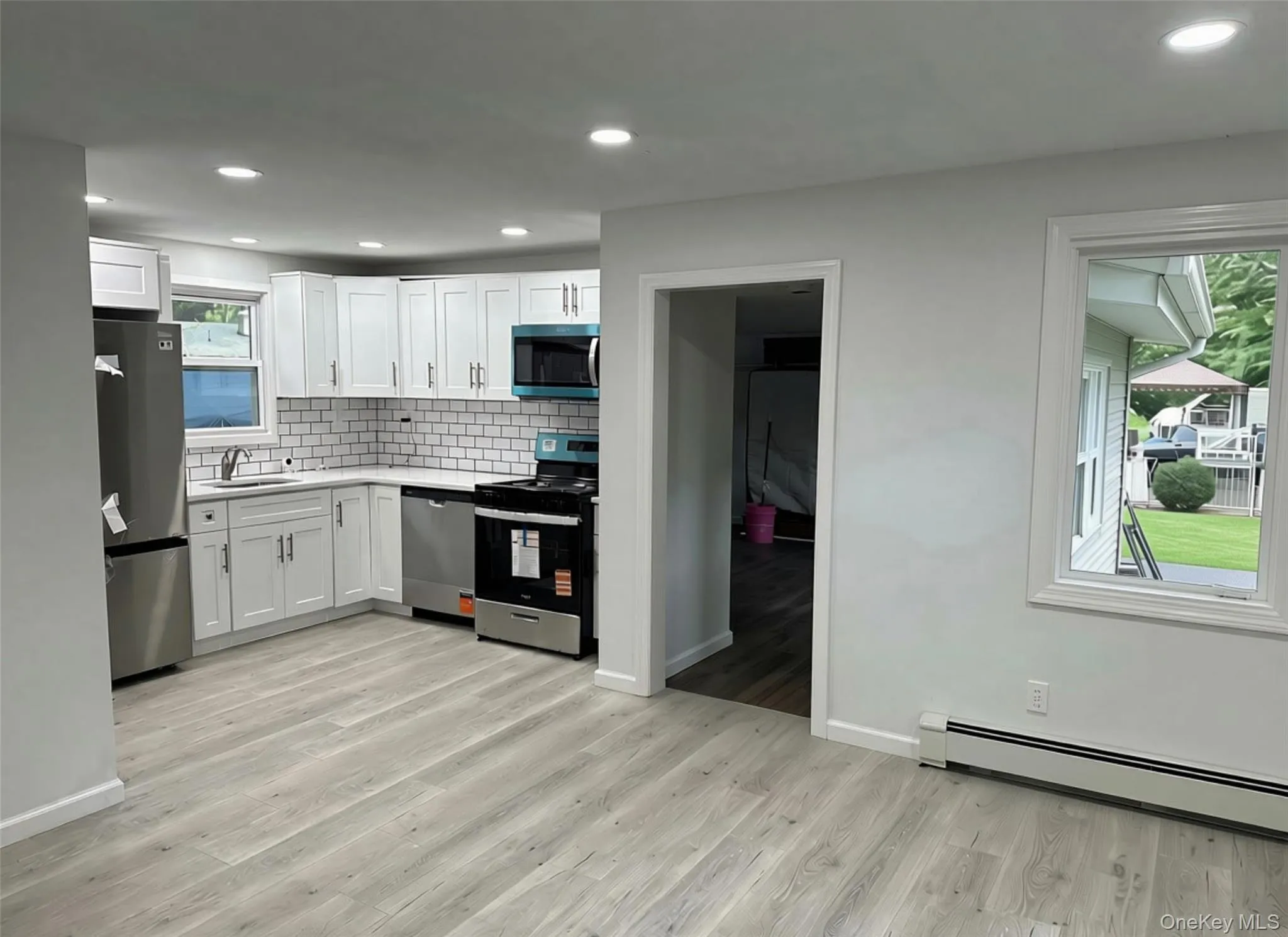 Brand new kitchen with stainless steel stove, refrigerator and dishwasher Brand new kitchen with stainless steel stove, refrigerator and dishwasher