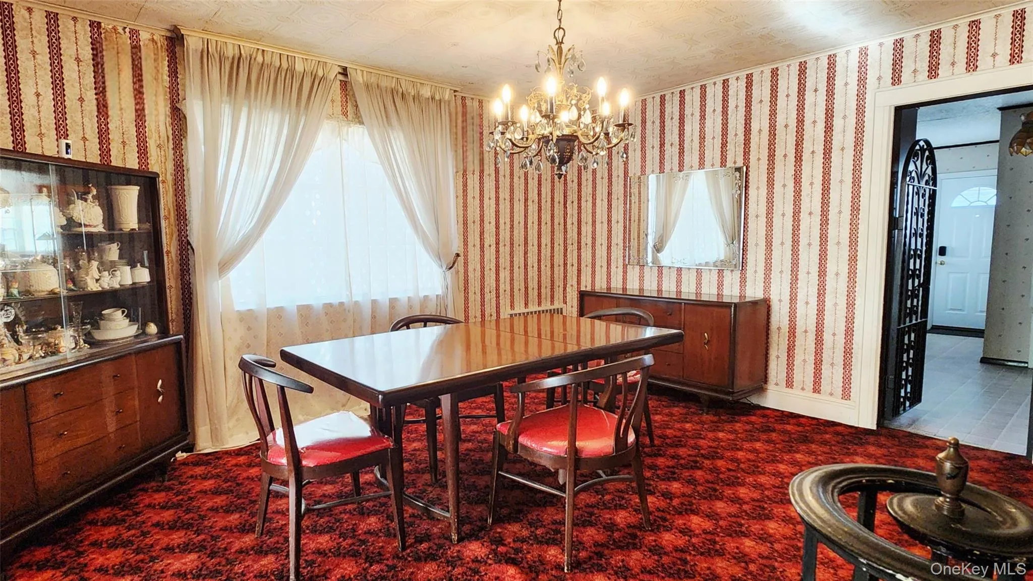 Formal Dining Room with Stairs to 2nd Fl and Kitchen Formal Dining Room with Stairs to 2nd Fl and Kitchen