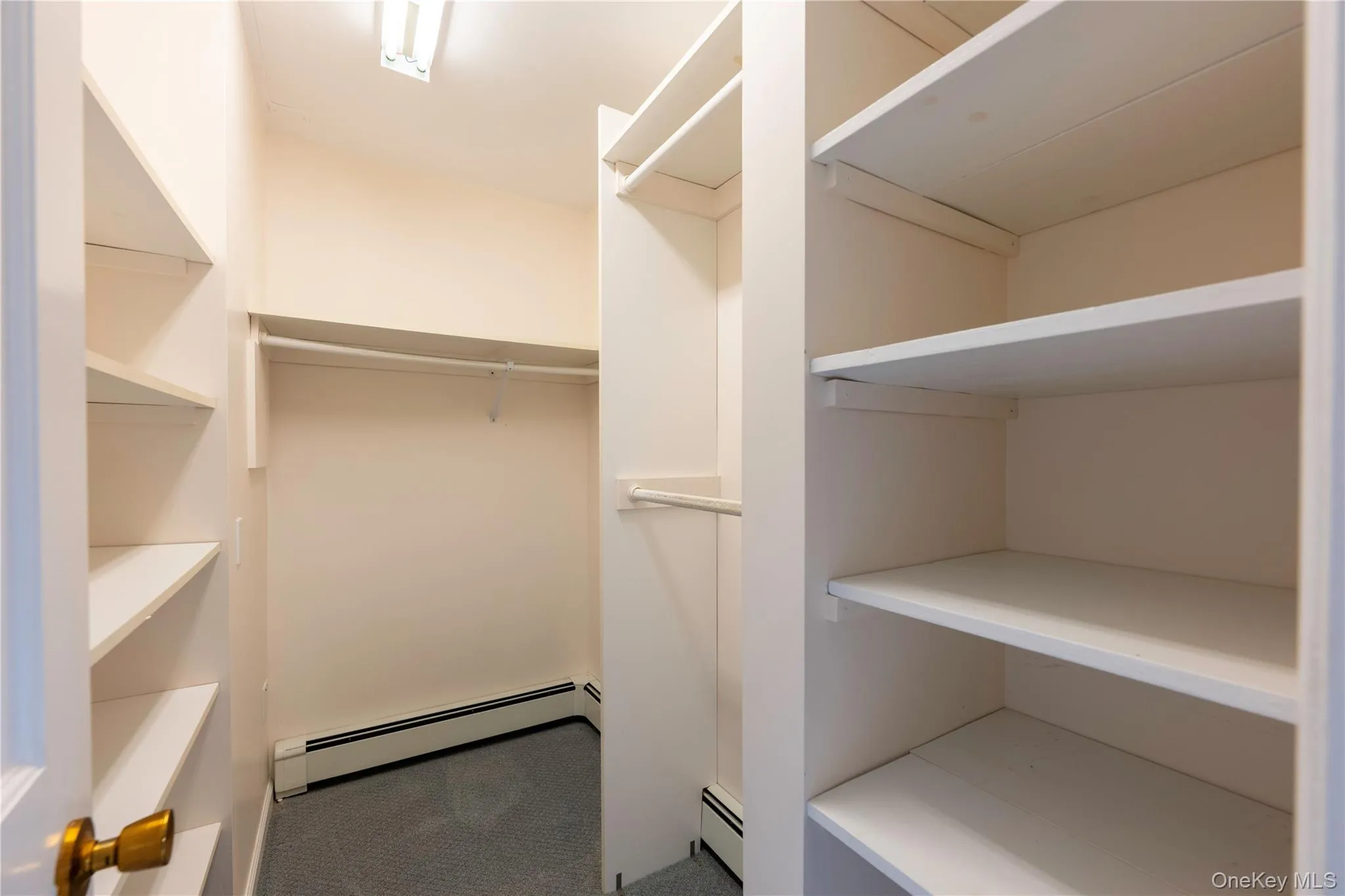 Primary bedroom walk in closet Primary bedroom walk in closet