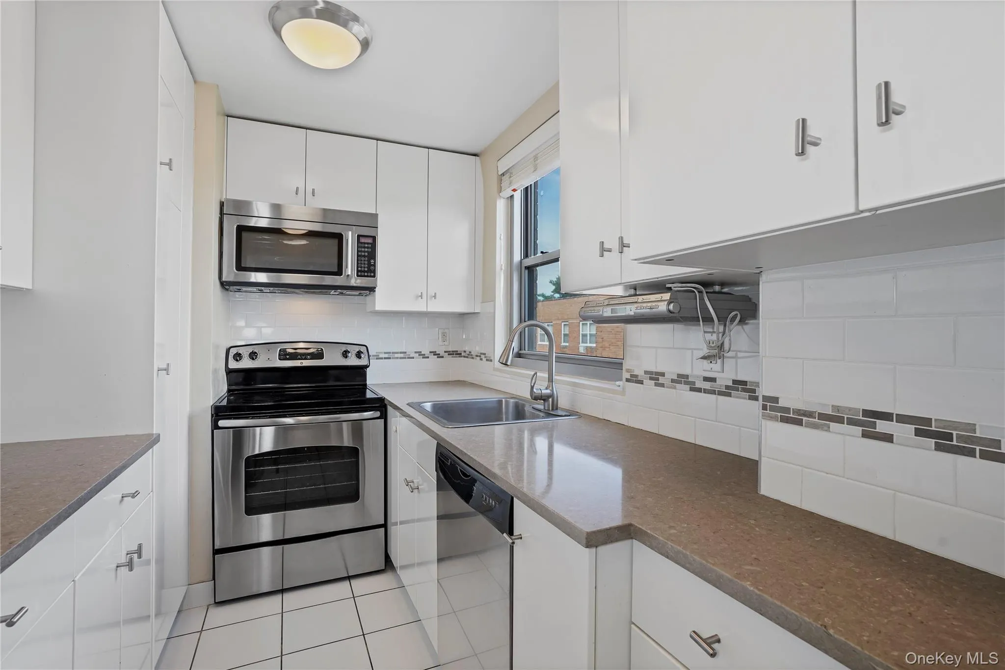 Kitchen With Stone Counters & Full Size Dishwasher Kitchen With Stone Counters & Full Size Dishwasher