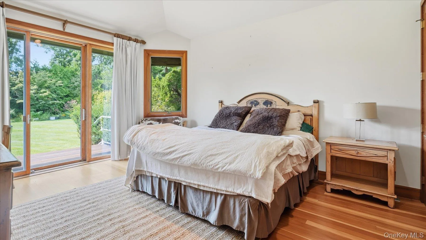 Bedroom at the end of deck with access to pool and rear yard Bedroom at the end of deck with access to pool and rear yard