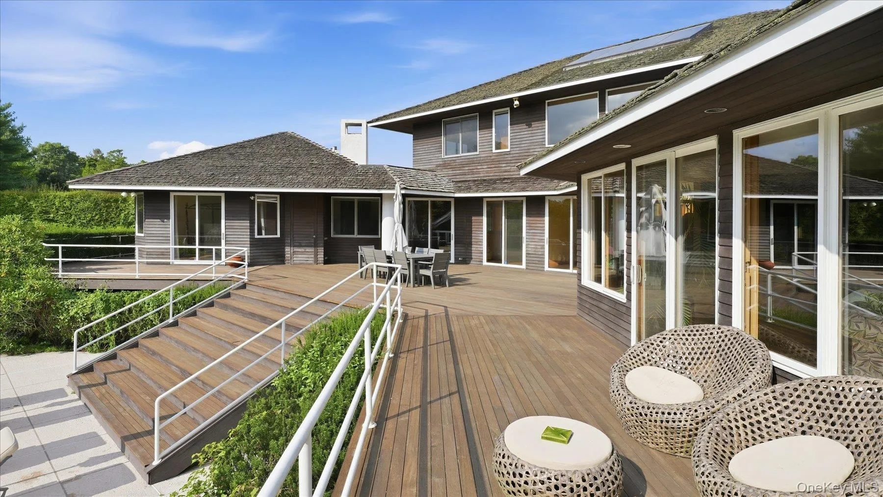 Wrap-around deck with guest bedroom at the end of the deck Wrap-around deck with guest bedroom at the end of the deck