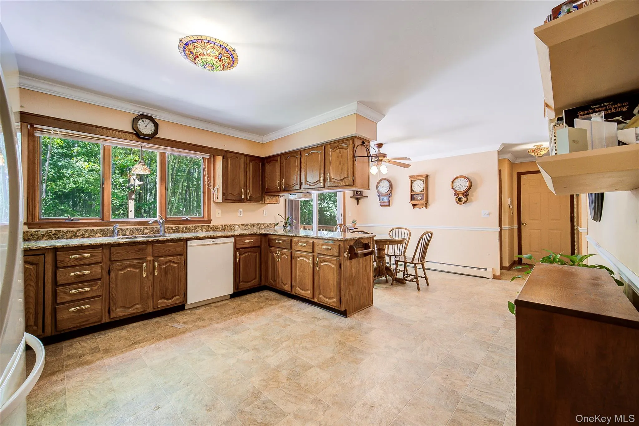 Panoramic window over the sink provides natural wonder and light! Panoramic window over the sink provides natural wonder and light!