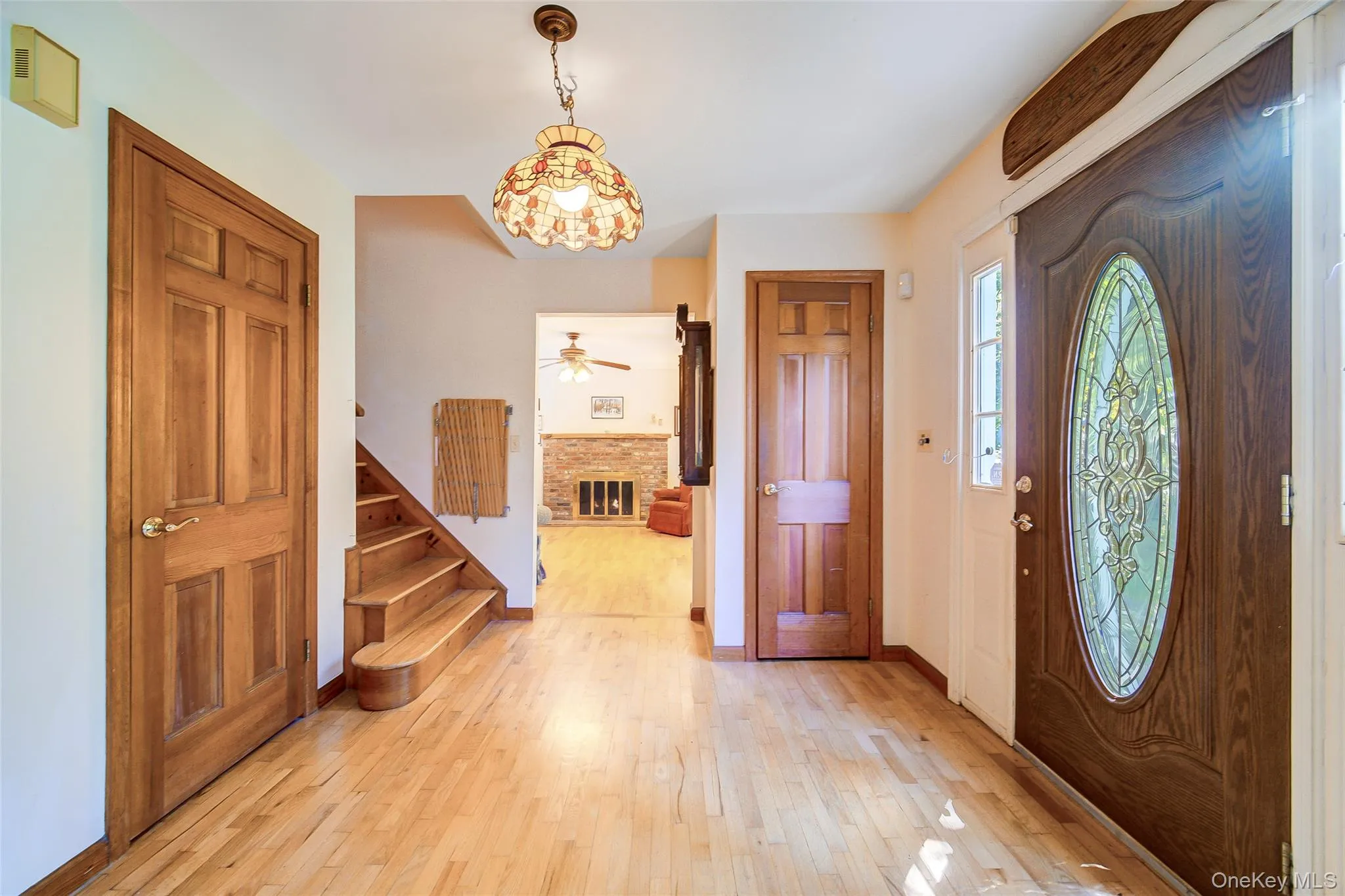Hardwood flooring throughout the home. A decorative front entry door and a traditional staircase welcome you home Hardwood flooring throughout the home. A decorative front entry door and a traditional staircase welcome you home