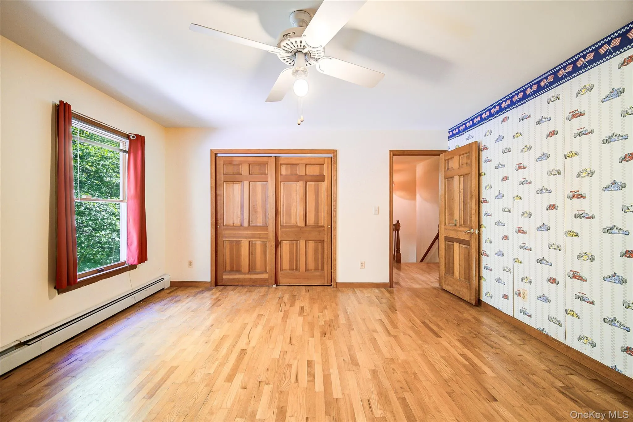 Bedroom #4 has hardwood floors a large closet and ceiling fan. Bedroom #4 has hardwood floors a large closet and ceiling fan.