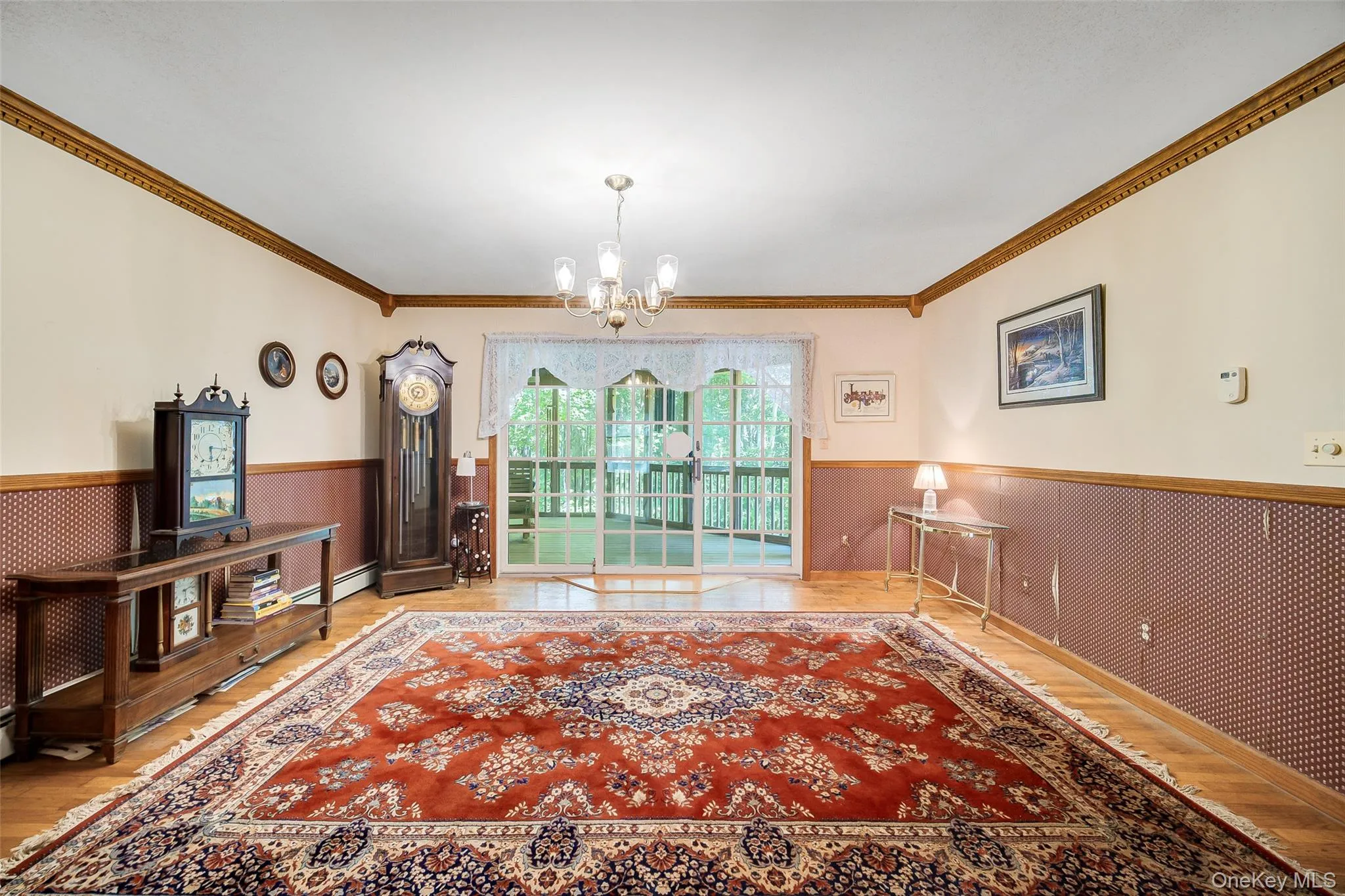 Formal Dining is easy in this oversized room with slider walk-outs to stunning screened in porch. Formal Dining is easy in this oversized room with slider walk-outs to stunning screened in porch.