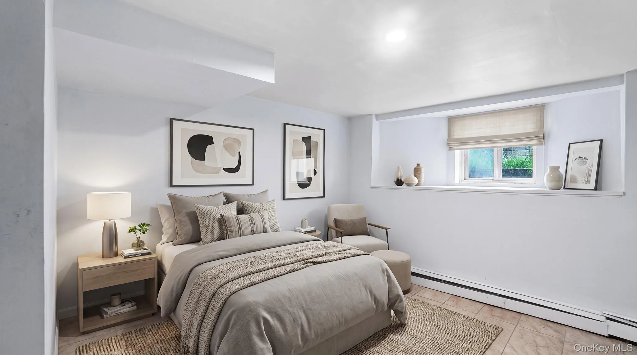Recessed window with a light-filtering shade, tile flooring, and a low-profile baseboard heater Recessed window with a light-filtering shade, tile flooring, and a low-profile baseboard heater