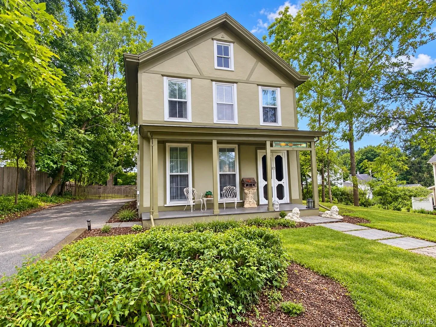 Adorable village home with covered porch. Adorable village home with covered porch.