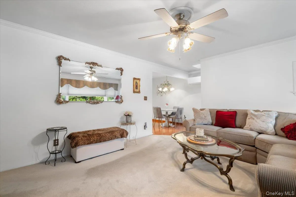 Living room has seamless access to dining area and eat-in kitchen. Living room has seamless access to dining area and eat-in kitchen.