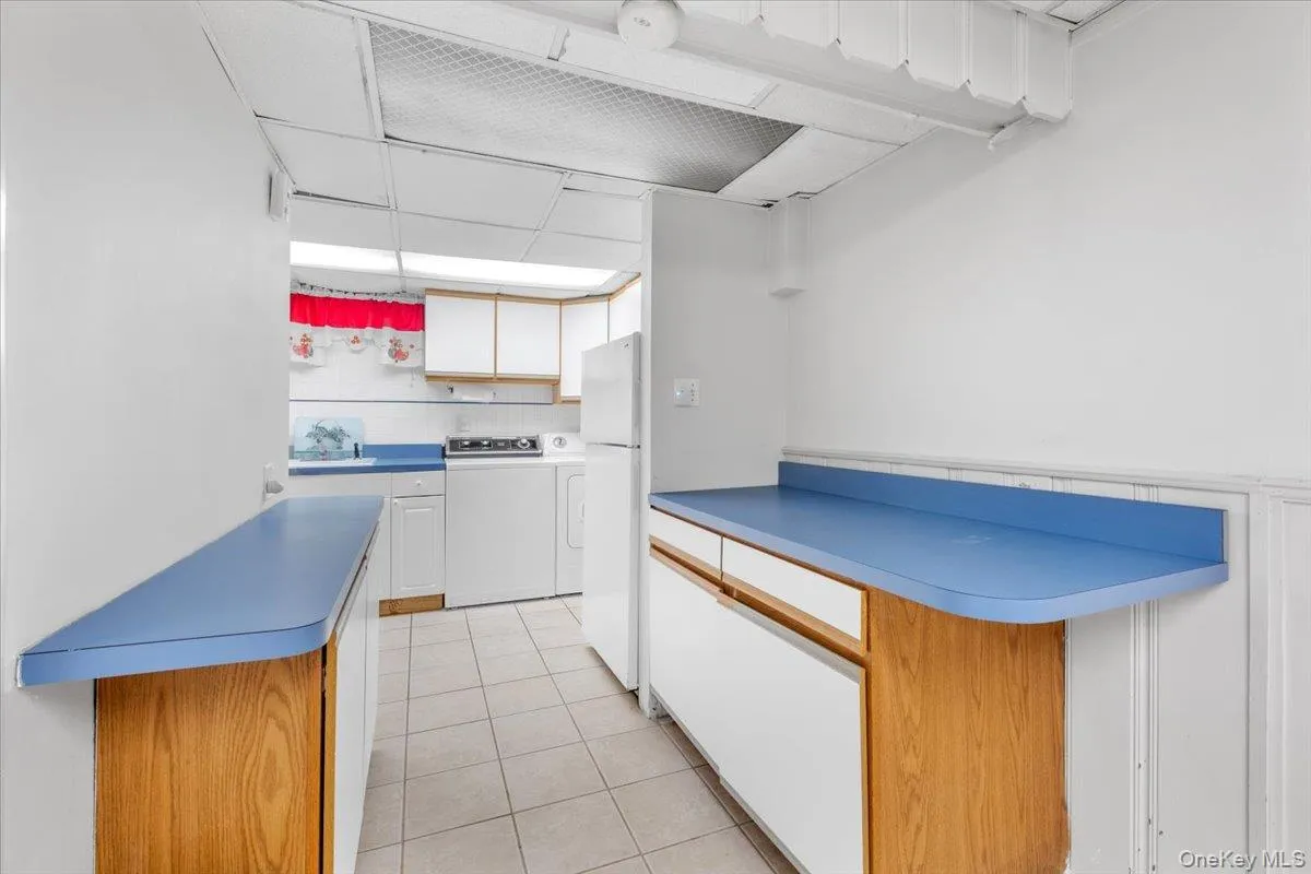 Spacious lower level, with laundry access and additional storage. Spacious lower level, with laundry access and additional storage.