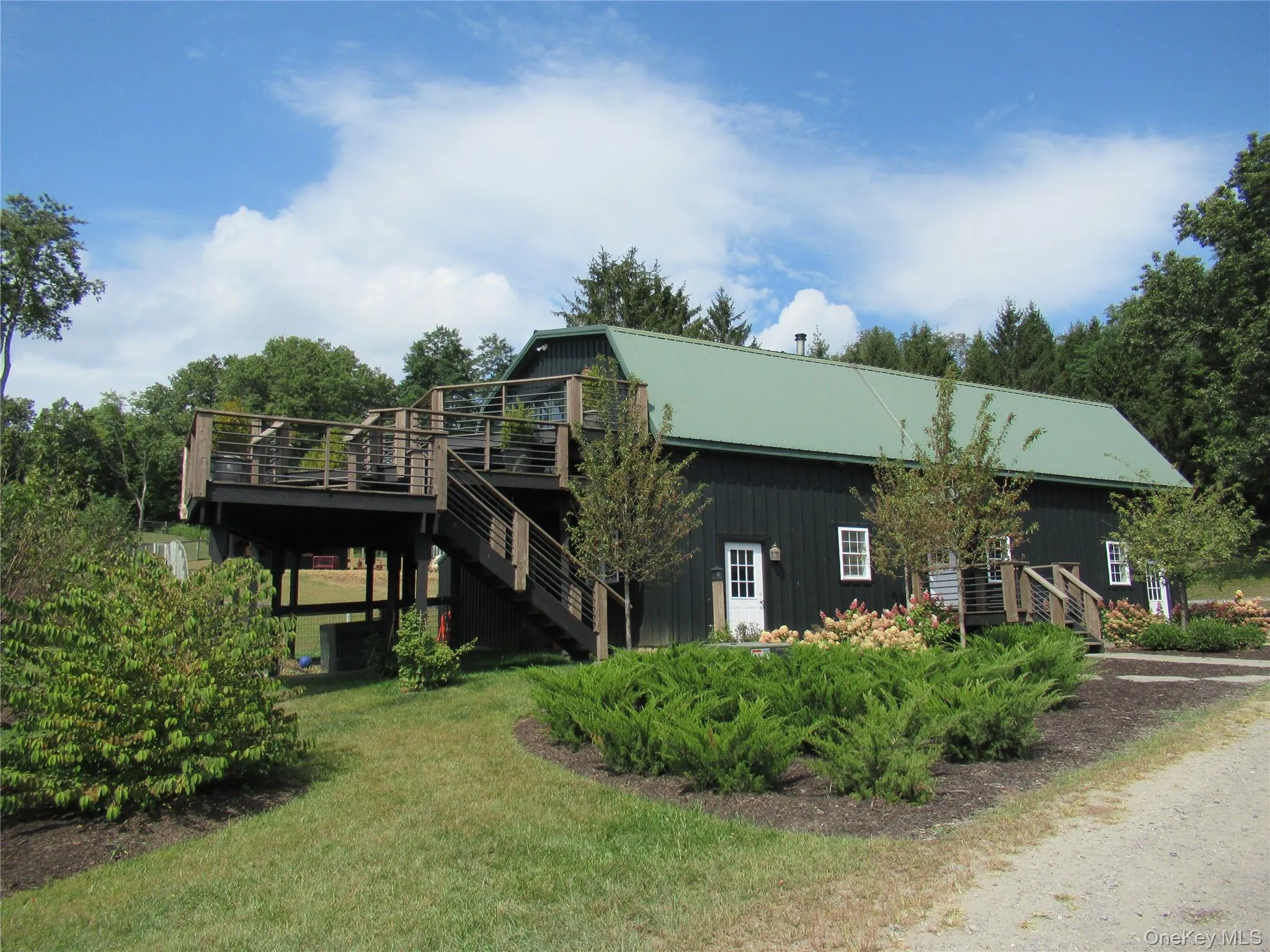 View of the entire barn with 2 tiered deck View of the entire barn with 2 tiered deck