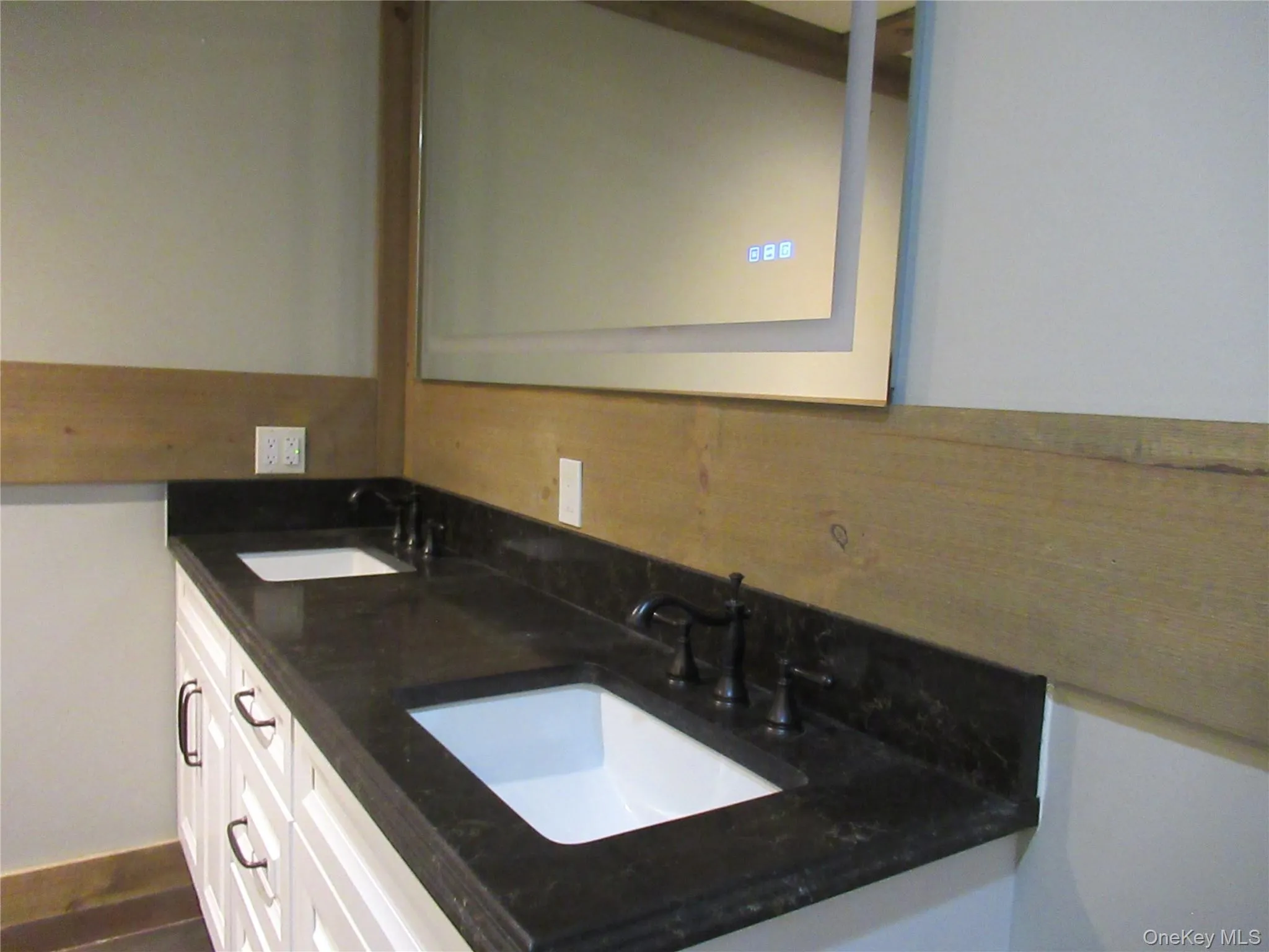 Featuring double vanity, smart defogging mirror Featuring double vanity, smart defogging mirror