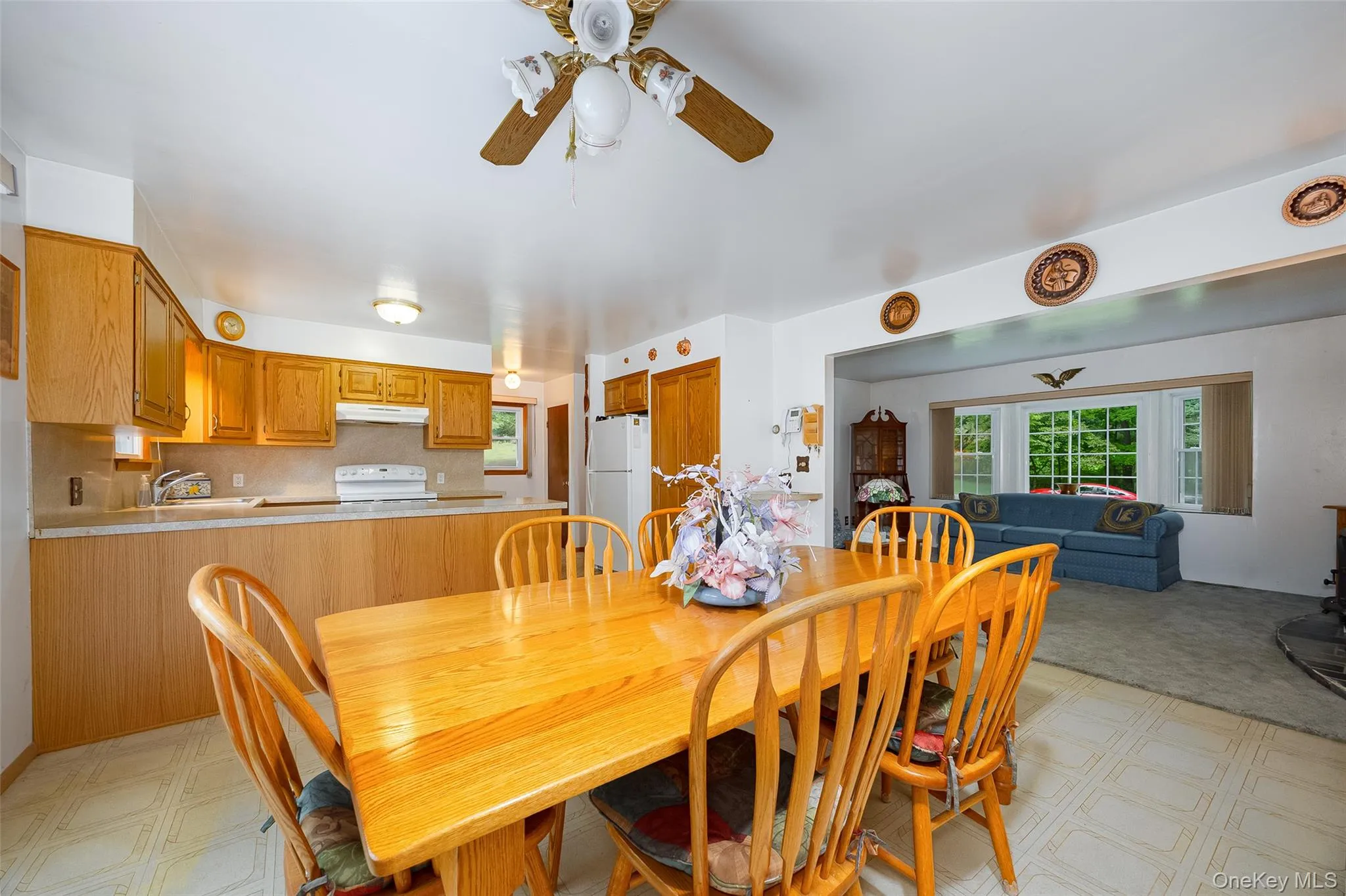 View of dining, living and kitchen areas. View of dining, living and kitchen areas.