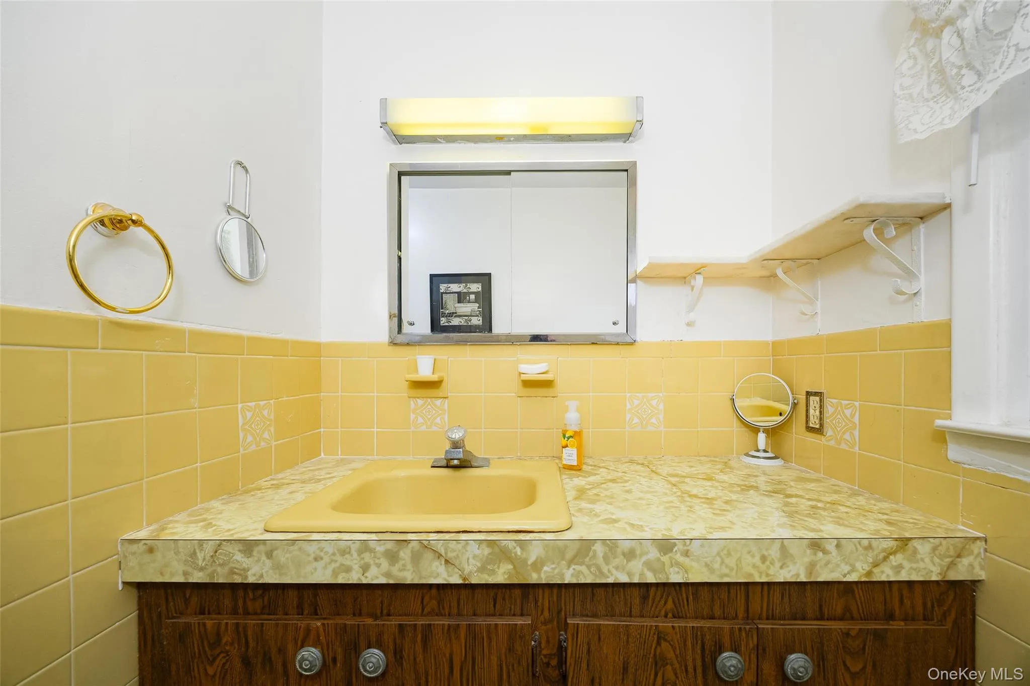 Vanity in downstairs bathroom. Vanity in downstairs bathroom.