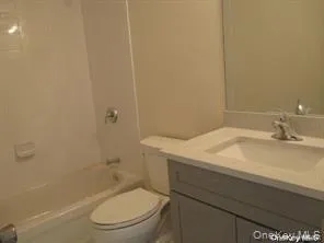 Full bath featuring vanity and shower / tub combination Full bath featuring vanity and shower / tub combination