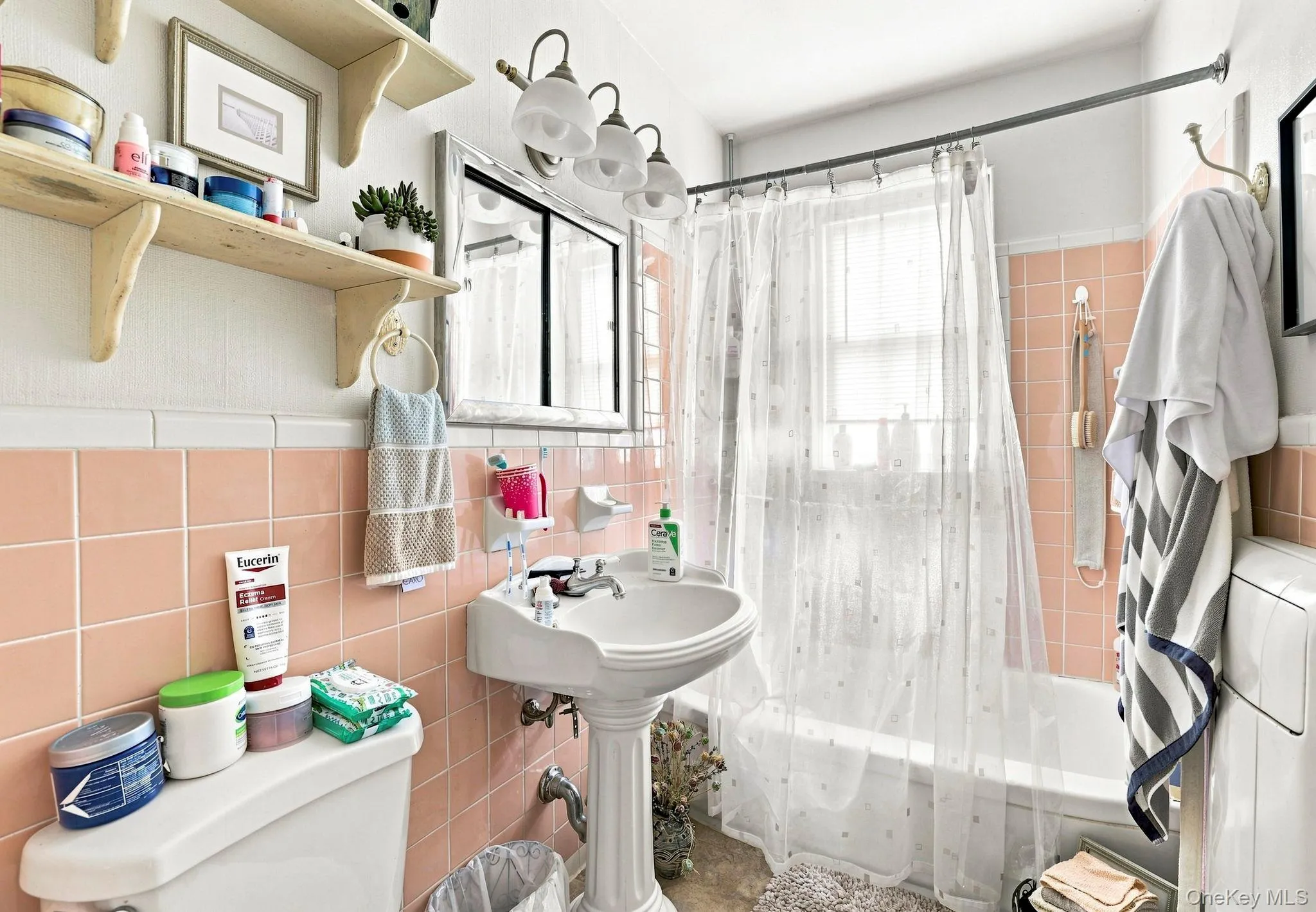 There is a hall bathroom with window and bathtub for future children occupants There is a hall bathroom with window and bathtub for future children occupants