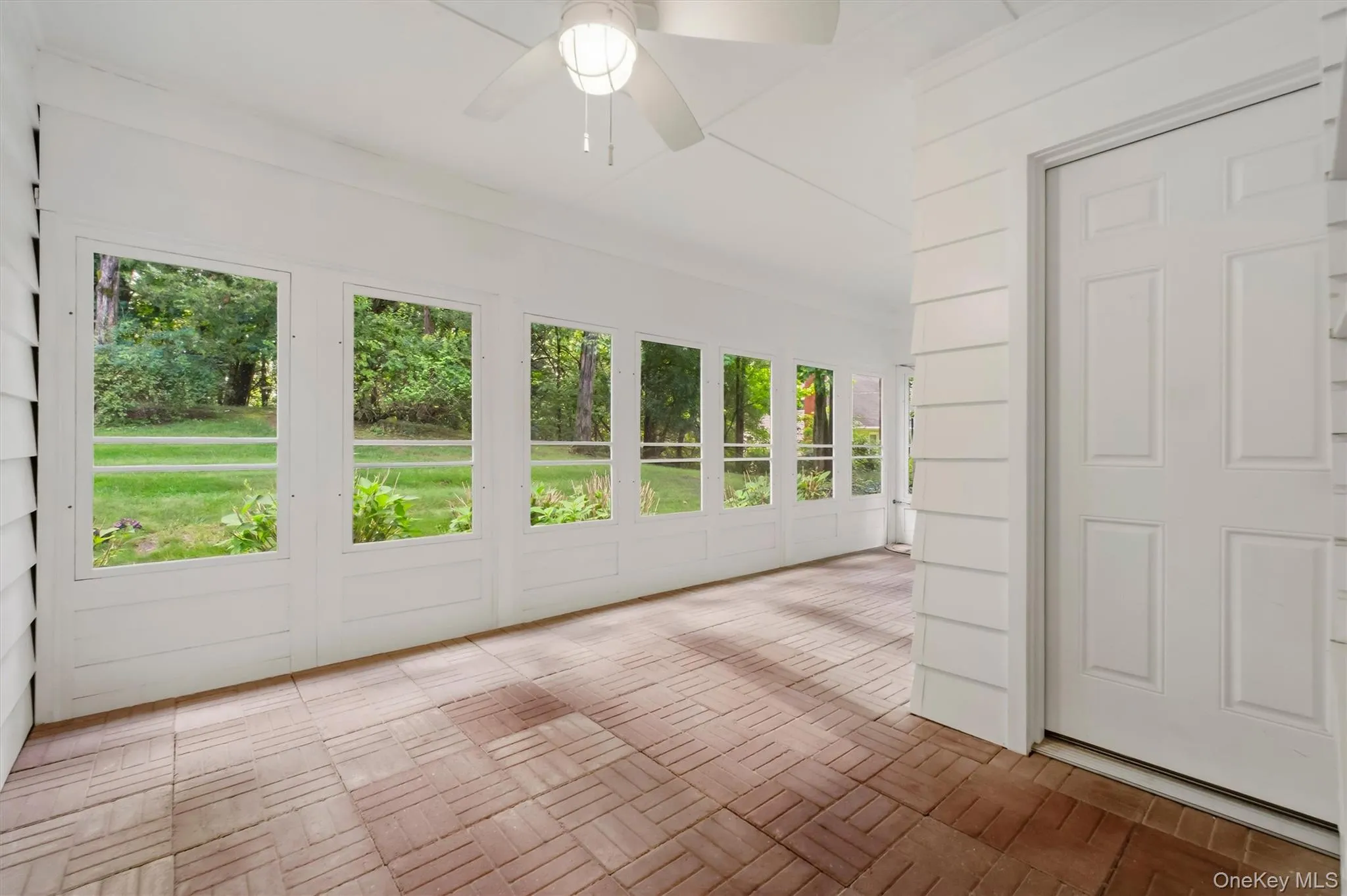 Screened porch with storm windows Screened porch with storm windows