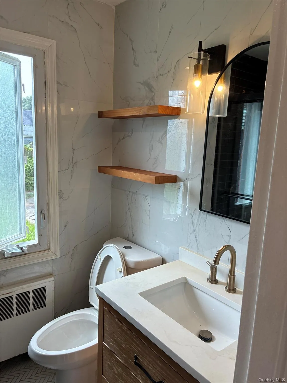 White tile walls with subtle gray veining White tile walls with subtle gray veining