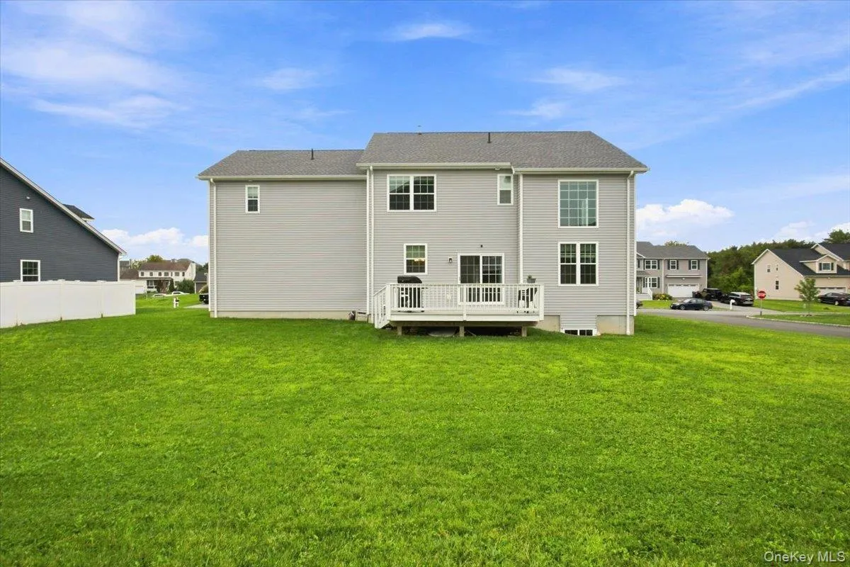 Expansive backyard with a large lawn Expansive backyard with a large lawn