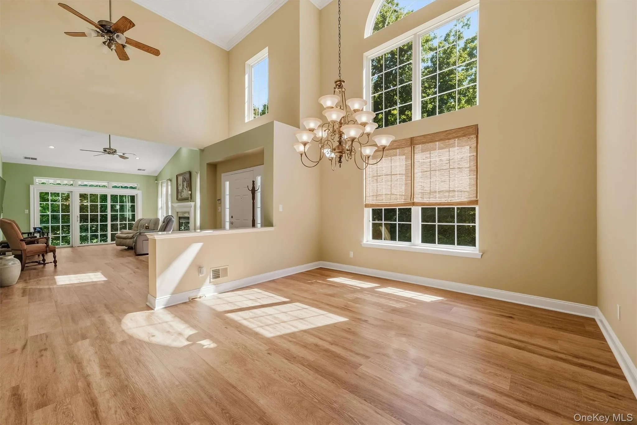 Soaring vaulted ceilings with wood-finish flooring Soaring vaulted ceilings with wood-finish flooring