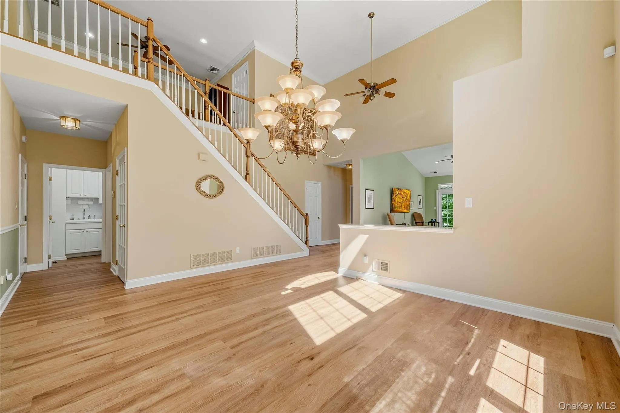 Open area living room with access to stairs Open area living room with access to stairs